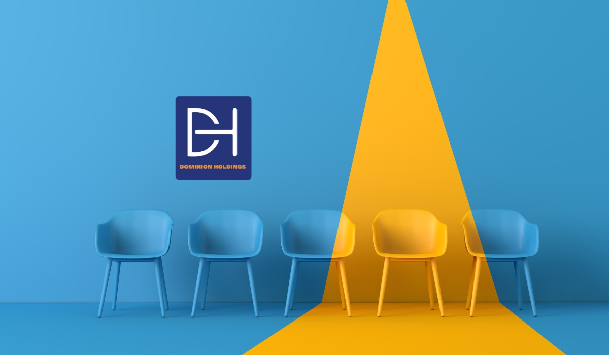Psychometric assessment expert guiding a diverse team in South Africa through personality and skills testing in a professional office environment